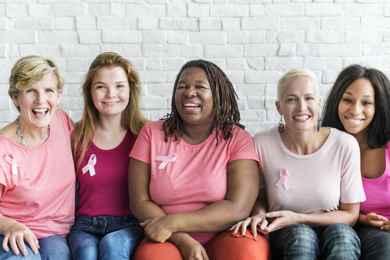 Breast cancer survivors sitting together