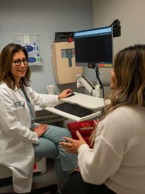 Dr. Sanaz Memarzdeh consulting with patient Grace Geaga